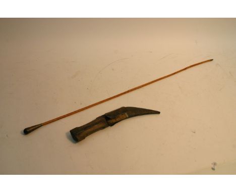 A swagger stick and Kukri knife