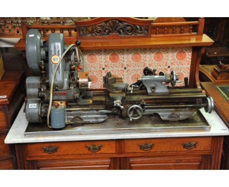 A Single Phase Myford engineers lathe, possible an ML7 model with two boxes of various accessories and precision engineering 