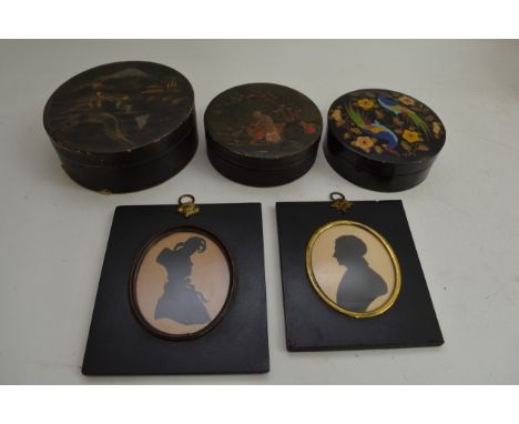 Two framed portrait silhouettes and three lacquer type trinket boxes