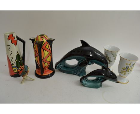 Nine examples of Lorna Bailey pottery comprising six sifters, an 'Arabesque' vase and 'Marshland Cottage' jug, including limi