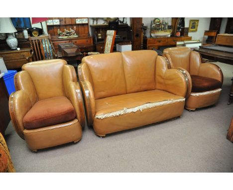 Art Deco cloud style three piece suite comprising two seater sofa and two arm chairs with walnut trim in brown leather 