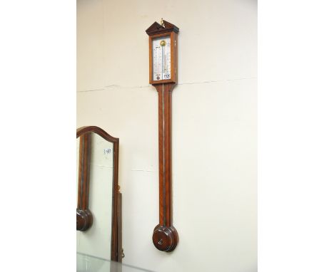 A reproduction mahogany stick barometer a committee London