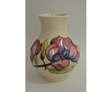 A large limited edition boxed Moorcroft vase designed by Philip Gibson, decorated with Magnolia type flowers. Signed and numb