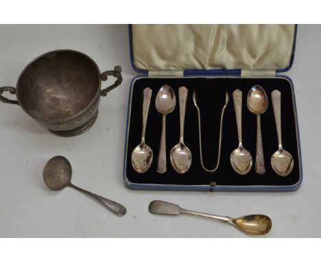 A small twin handled silver bowl, a cased set of silver plated teaspoons, one other and a ladle