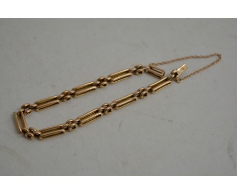 A 15ct gold gate bracelet 9g approx 