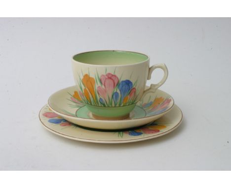 A Clarice Cliff crocus pattern trio, gold Royal Staffordshire backstamp