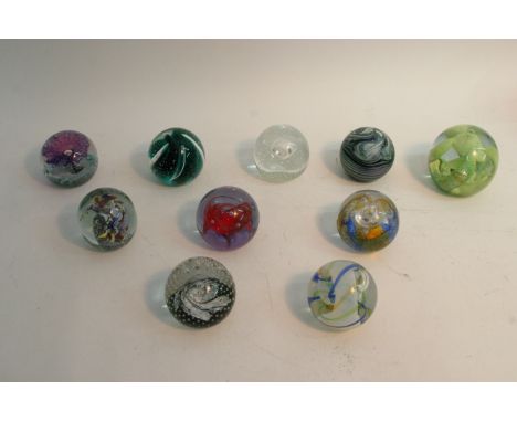 A collection of glass paperweights including Caithness (10)