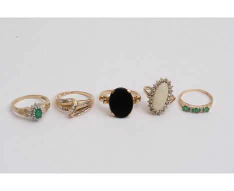 Five gold rings set with coloured stones including one set with an opal, approx 13g and sizes from between I and J up to betw