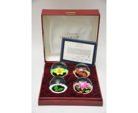 A boxed limited edition set of Caithness 'Four Seasons' paperweights designed by Colin Tarris. Number 74 of 500 with certific