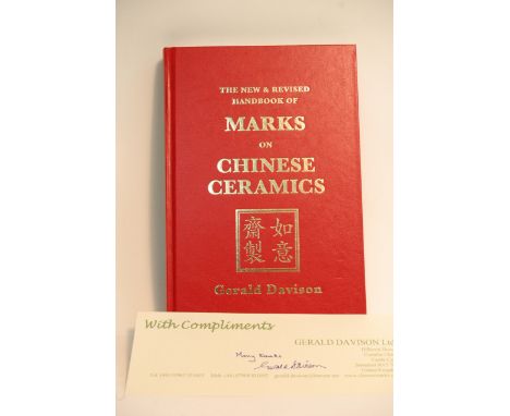 A first edition and out of print 'New and revised handbook of marks on Chinese ceramics' by Gerald Davison with signed compli