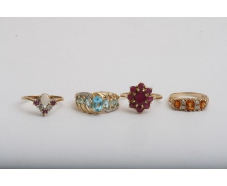 Another four gold rings set with coloured stones including one set with an opal, approx 10.3g and sizes between M and O.