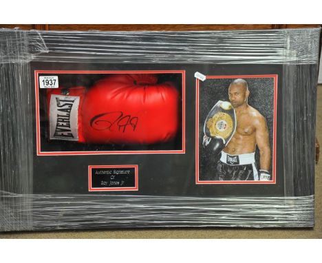 A framed boxing montage containing a signed Roy Jones Jr boxing glove and print with certificate of authenticity, approx 67cm