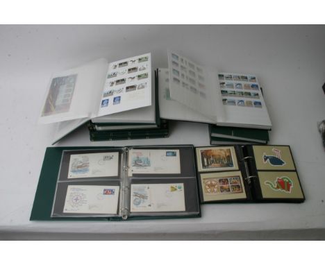 Nine albums of Great Britain postage stamps consisting mainly mint stamps, together with a small amount of First Day covers a