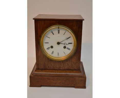 19th Century French rosewood case mantel clock striking on a bell having enamel dial with roman numerals