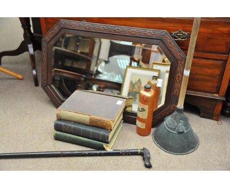 An oak wall mirror, clock, walking stick, poss stick, three books (Boy's own papers) and a bottle of vintage Bols.