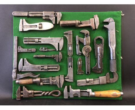 A display board covered in early adjustable spanners, some named including Vauxhall. 