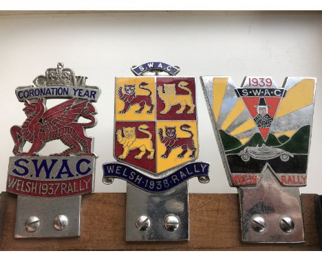A group of three SWAC Welsh Rally part enamel and chrome plated badges for the Welsh Rallies 1937, 1938 and 1939, all stamped
