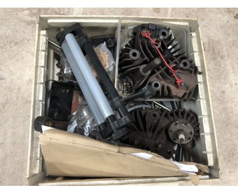 A box of vintage motorcycle parts.