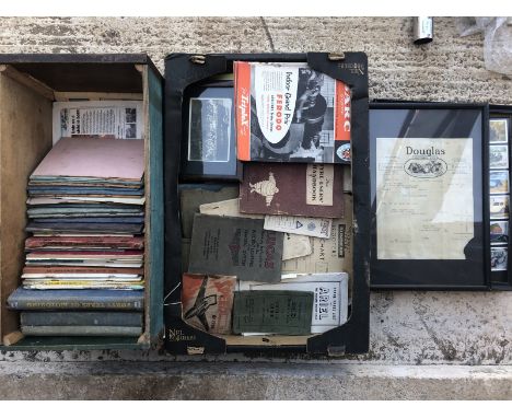 A quantity of vintage car and motorcycle handbooks etc. related literature including a framed Douglas Motors bill of sale dat