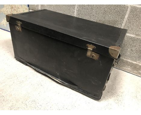 An Orderlee travelling trunk with fold-down trunk and brass fitted.