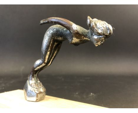 A car accessory mascot in the form of a diving female nude, signed AEL.