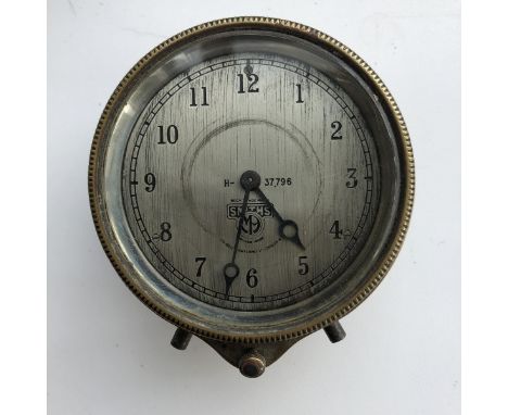 A Smiths silver faced rim-wind eight day car clock.