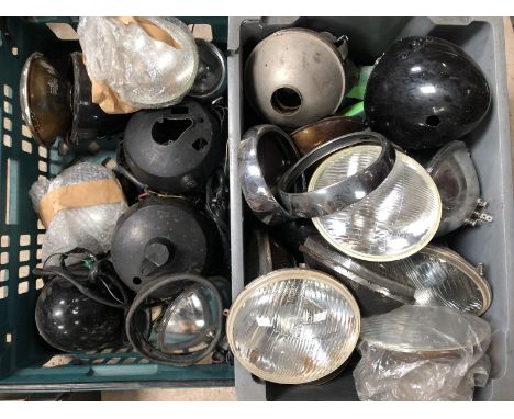 Two boxes of headlamp parts.