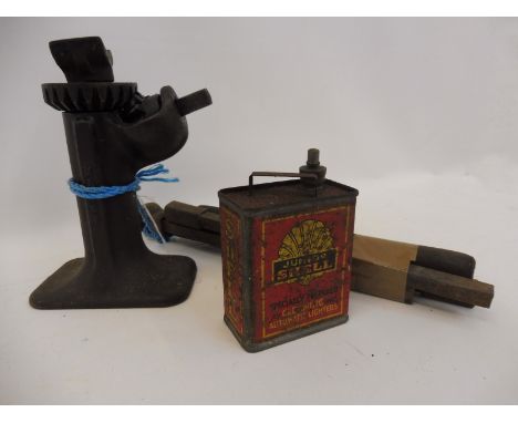 A Junior Shell light fuel can plus a jack with handle.