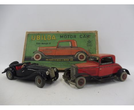 A Chad Valley Ubilda tinplate clockwork motorcar, with original box plus a Victory Industries model of an MG TF.