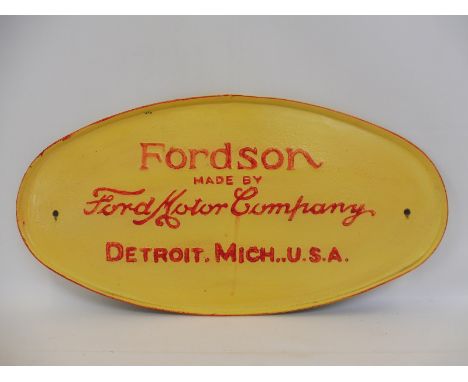 A Fordson Tractor embossed oval panel, 18 x 9".