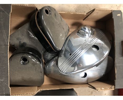 A box of engine covers and toolboxes. 