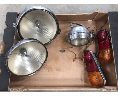 Two Bentley headlamp reflectors, a Raydyot pass lamp and two rear lamp clusters.