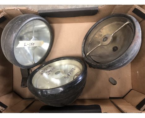Two Lucas R160S headlamps and a Lucas L150 headlamp. 