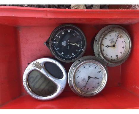 Three Smiths eight day car clocks and a Stop light.