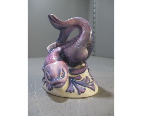 A Moorcroft/Bronte 'Hesperian Carp' ornament designed to decorate the top of an enamel box, initials 'JM' to the underside, 7