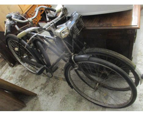 Two early/mid 20th century Raleigh bikes to include a gents and a ladies bikeLocation: G 