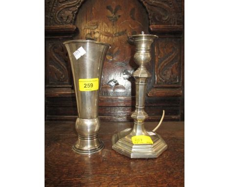 A silver vase, Mappin & Webb,, 20cm high and a silver candlestick converted to a lamp, 21cm high, weight of silver 200gLocati