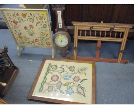 An early 20th century oak barometer, together with two tapestry screens and a wall hanging coat/hat stand 
