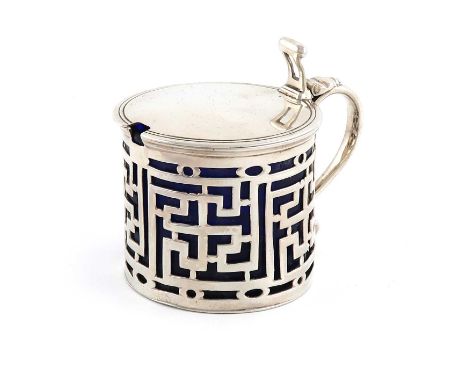 A George III silver mustard pot,by Augustin Le Sage, London 1765,circular form, scroll handle, pierced with geometric decorat