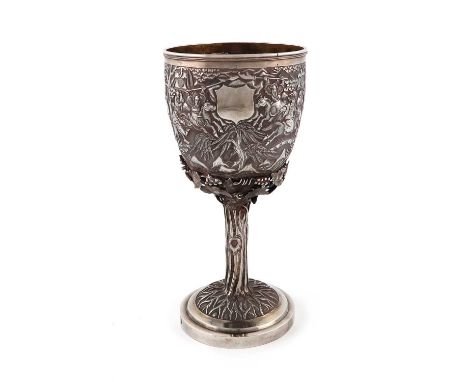 A 19th century Chinese Export silver goblet, by Hoaching, Canton circa 1860, circular form, chased with a battle scene, gilt 