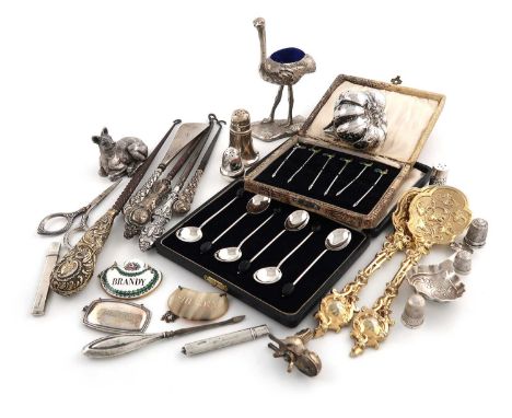 A mixed lot of silver and electroplated items,comprising: a cased set of six silver and enamel cocktail sticks, modelled as c