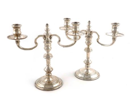 A pair of modern silver two-light candelabra,by William Comyns &amp; Sons Ltd, London 1963,in the George I manner, knopped ba