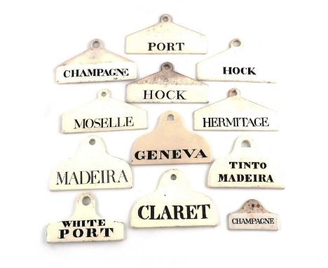 A collection of twelve 19th-century ceramic bin labels,including: a small one by Farrow and Jackson, titled 'CHAMPAGNE', plus