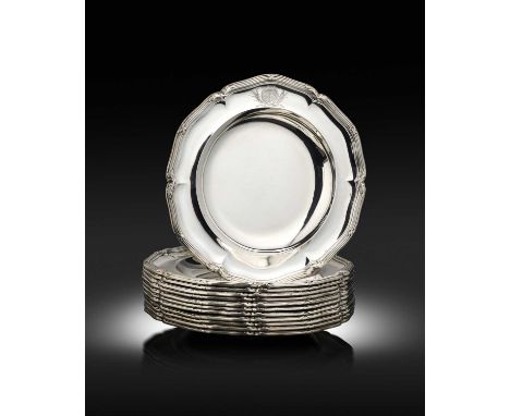 A set of twelve George III silver soup plates from the Pelham service, by Paul Storr, London 1808,circular shaped form, ribbo