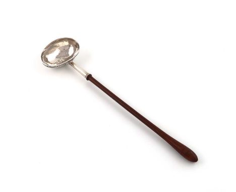 A George II West Country silver punch ladle,possibly by Sampson Bennett of Falmouth, Exeter 1740,oval form, turned wooden bal