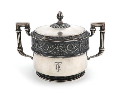 By Fabergé, a Russian two-handled silver sugar bowl and cover,Moscow 1908-1917,circular form, with a band of classical swan a
