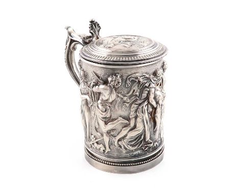 A Victorian electrotype tankard,by JG &amp; Sons,circular form, with reliefs of classical deity figures dancing, scroll handl