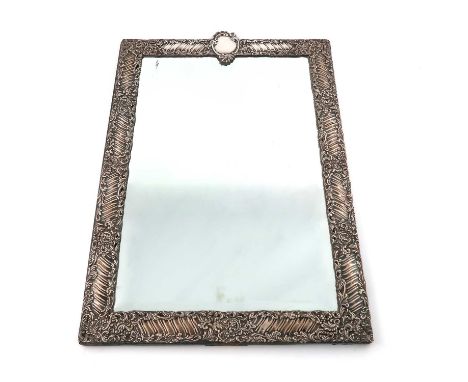 A Victorian silver-mounted mirror,by William Gibson &amp; John Langman, London 1898,rectangular form, pierced and chased foli