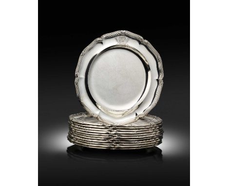 A set of twelve George III silver dinner plates from the Pelham service, by Paul Storr, London 1808,circular shaped form, rib