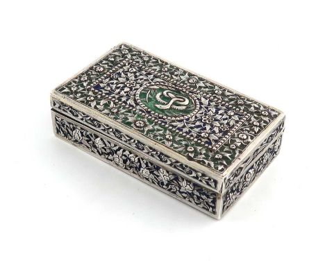 A Thai silver and enamel box,unmarked,rectangular form, with chased foliate decoration and green and blue enamel, with traces